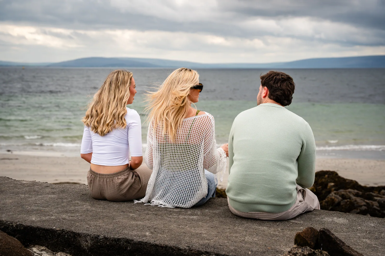 Galway Bay Hotel guests looking out over Galway Bay — Embrace the Wild campaign by TN Media